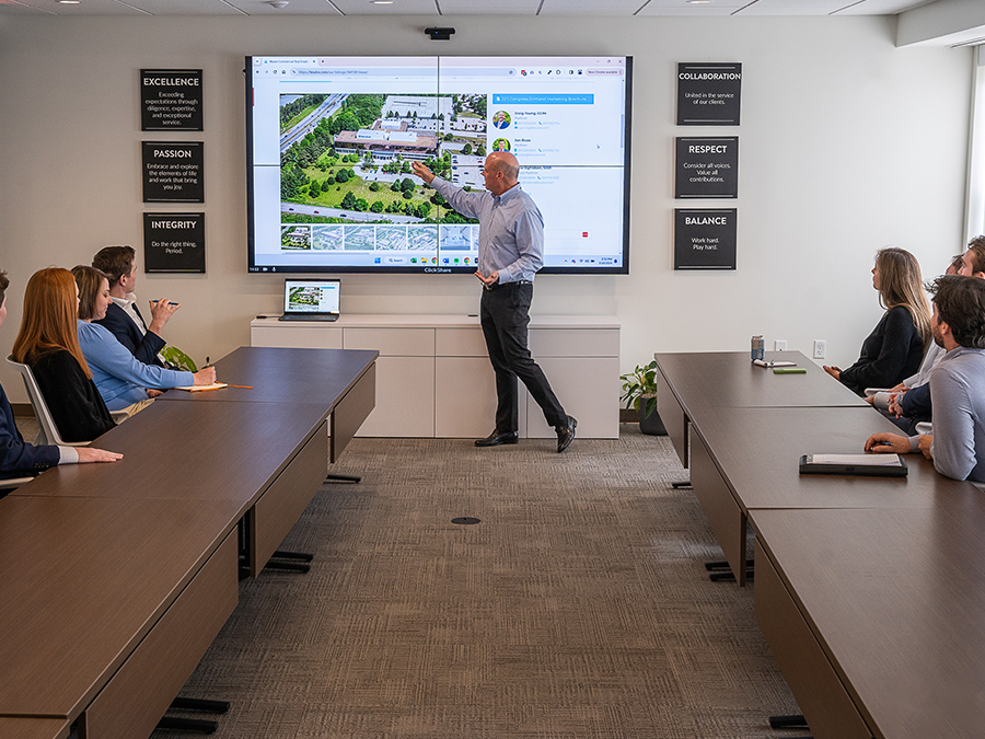 A person giving a presentation to a group of people