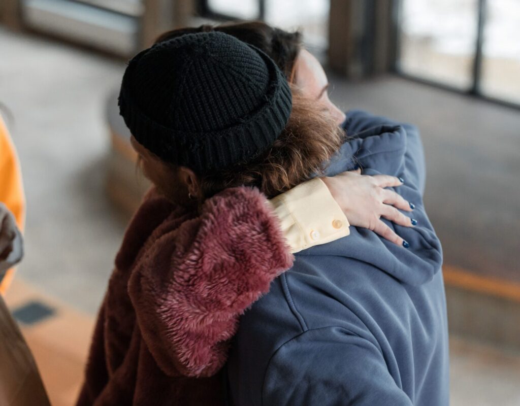 Two people hugging